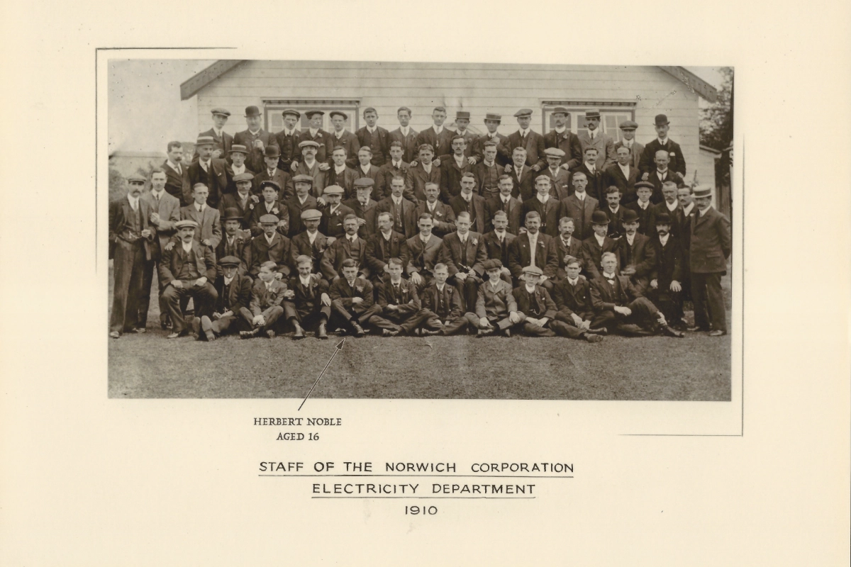 Historic group photograph of Norwich Corporation Electricity Department staff in 1910, including Herbert Noble aged 16.