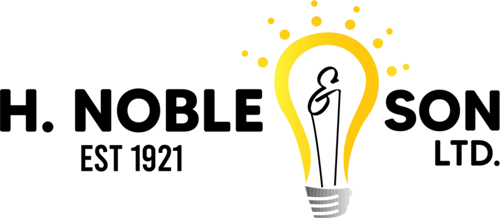 Yellow light bulb logo with glowing rays on a black background